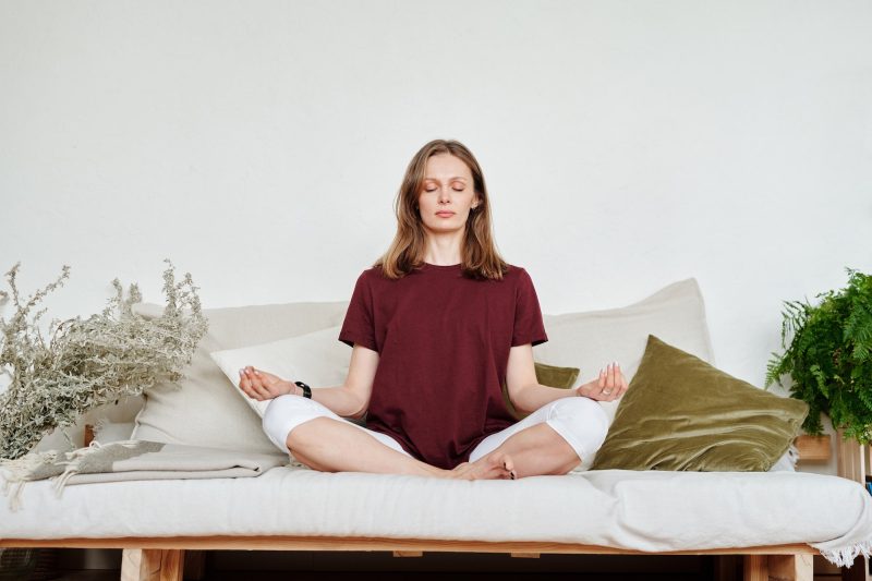 Woman meditating to help nervous system regulation